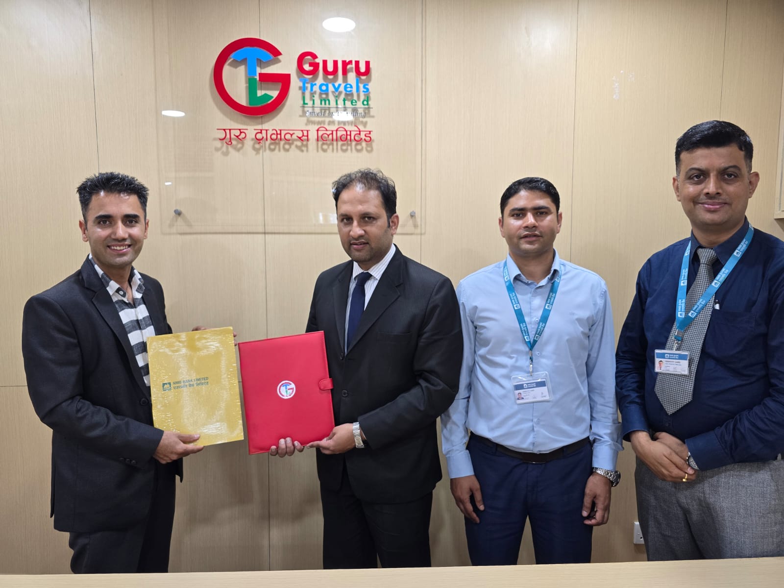 Guru Travels Limited and NMB Bank Sign Landmark Cooperation Agreement