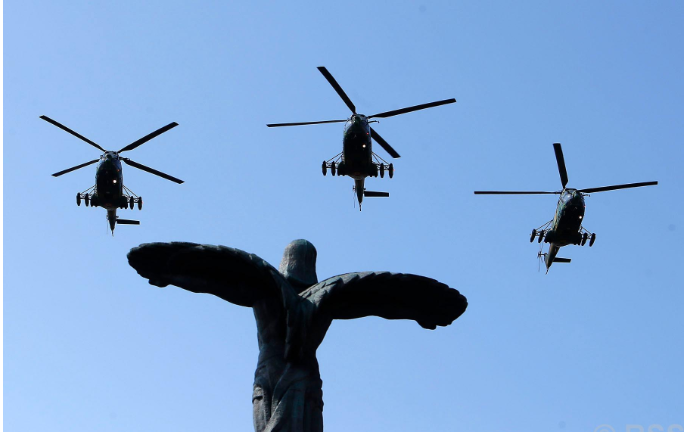 Military Helicopters Fly Over Statue of Air Heroes During Romanian Aviation and Air Force Day Celebrations