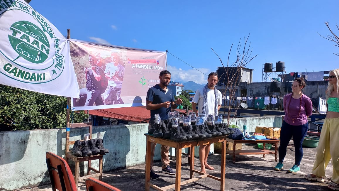 Trekking Boots and Supplies Distribution Program Held at TAAN Gandaki Office