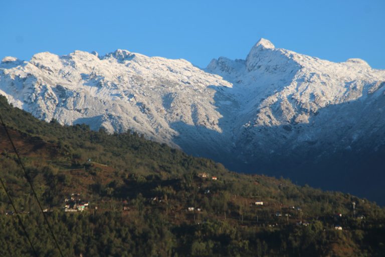 Taplejung’s Snow-Kissed Hills Sparkle Like Silver After Rainfall